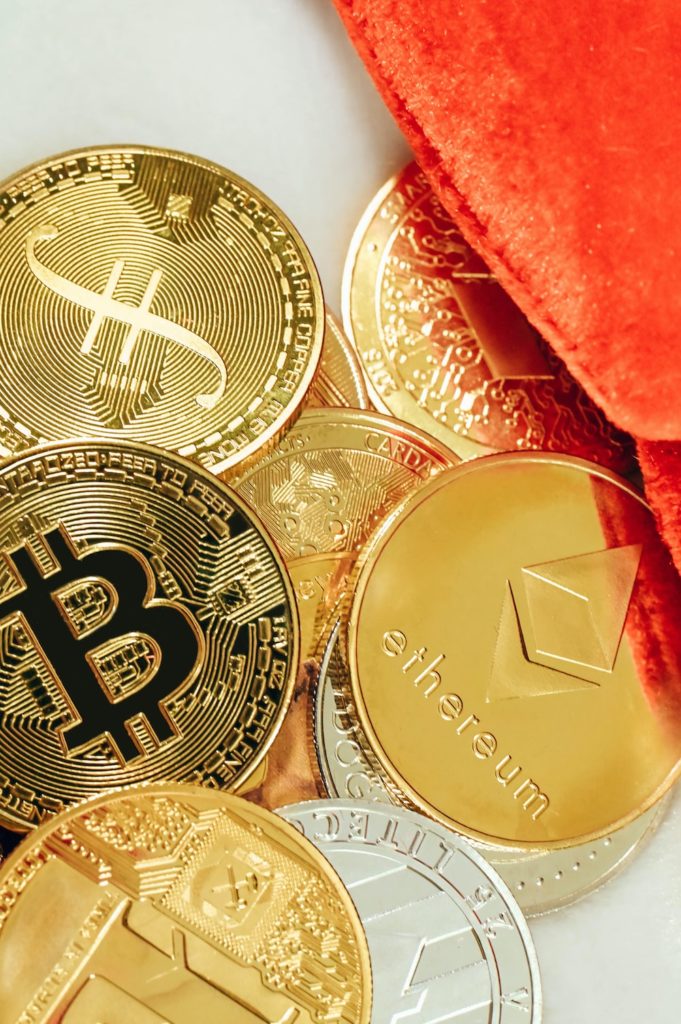 a pile of bitcoins sitting on top of a table